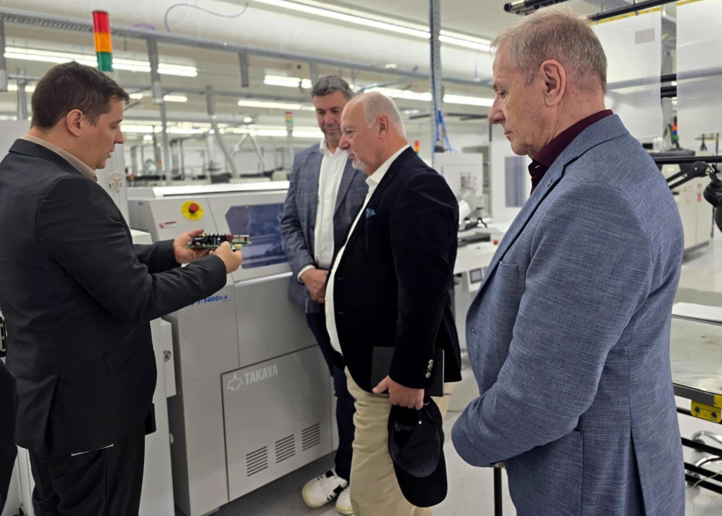 Dentons and Vipulse teams on the Nagykőrös production floor
