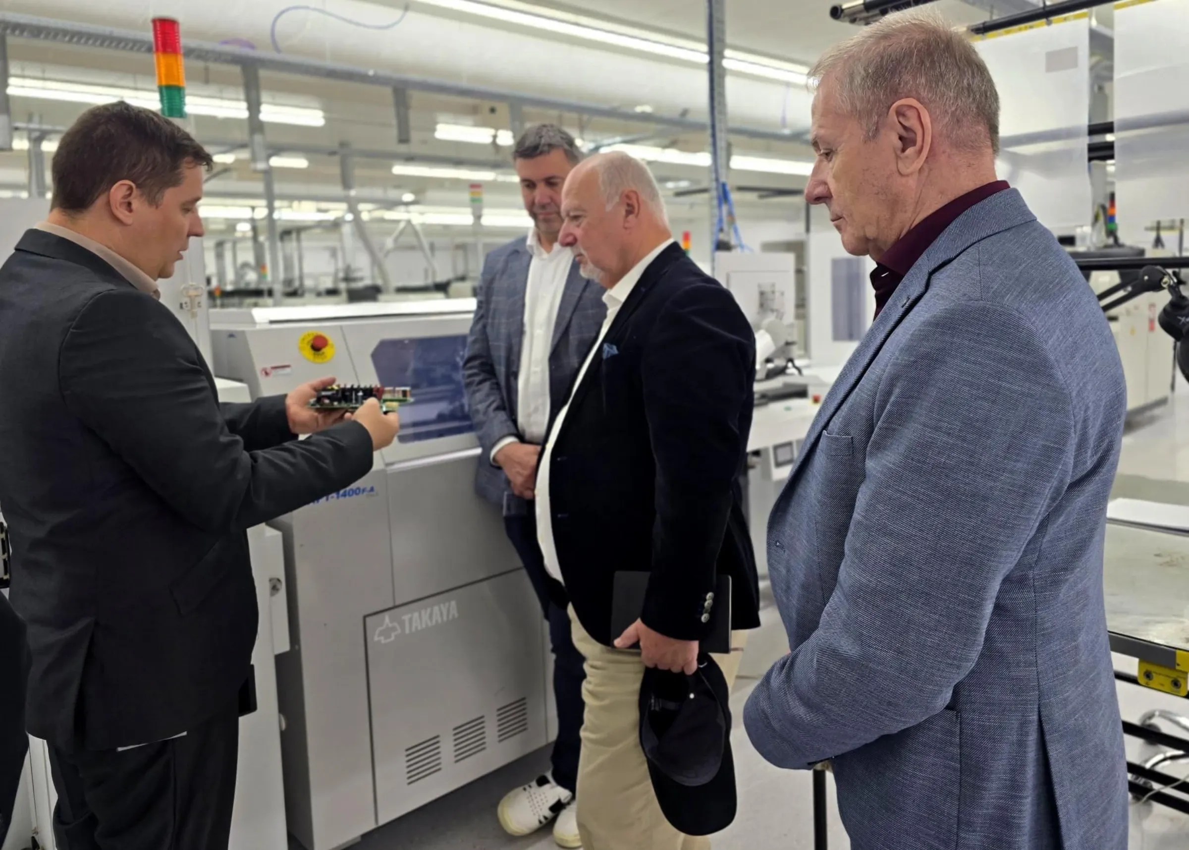 Dentons and Vipulse teams on the Nagykőrös production floor